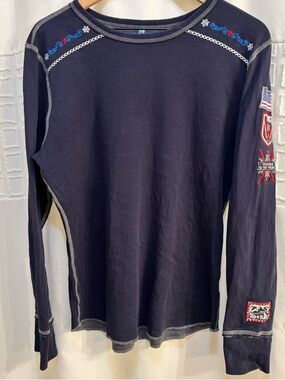 Collectible Alp-n-Rock, henley top, often embroidered patches on the sleeves XL